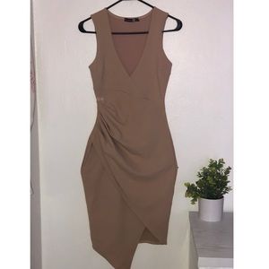 Beige bodycon dress with waist cinching